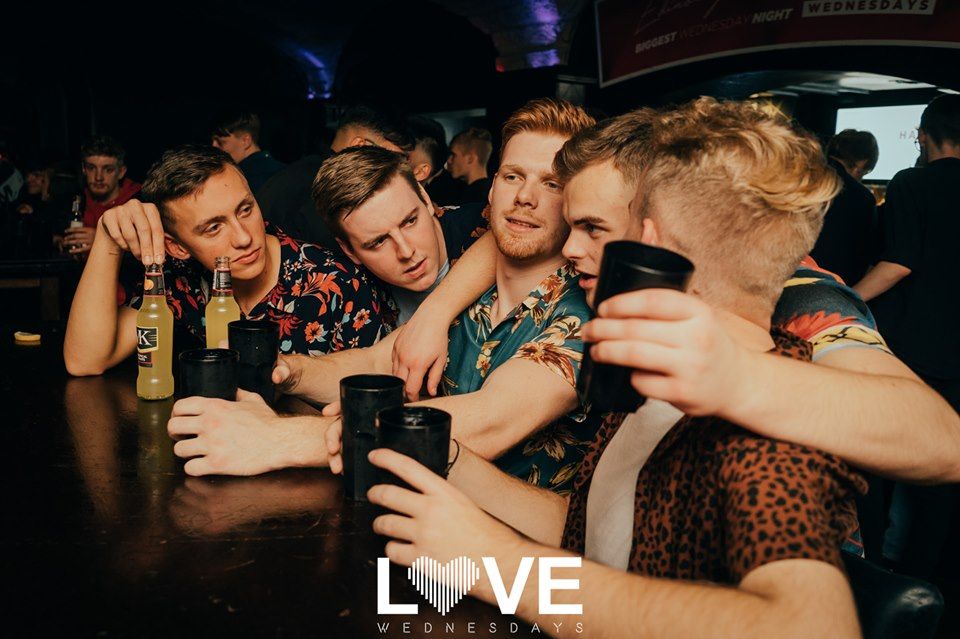 Image may contain: Night Club, Beverage, Alcohol, Drink, Beer, Pub, Bar Counter, Club, Night Life, Party, Person, Human