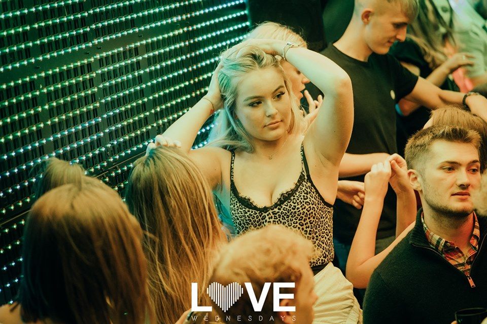 Image may contain: Night Club, Party, Club, Dance Pose, Leisure Activities, Person, Human