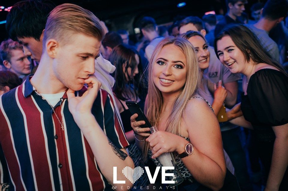 Image may contain: Night Life, Accessory, Sunglasses, Accessories, Night Club, Club, Party, Human, Person