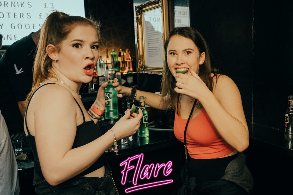 Image may contain: Night Life, Bartender, Beverage, Alcohol, Drink, Beer, Night Club, Worker, Club, Bar Counter, Pub, Person, Human