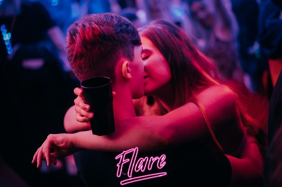 Image may contain: Night Life, Make Out, Person, Human