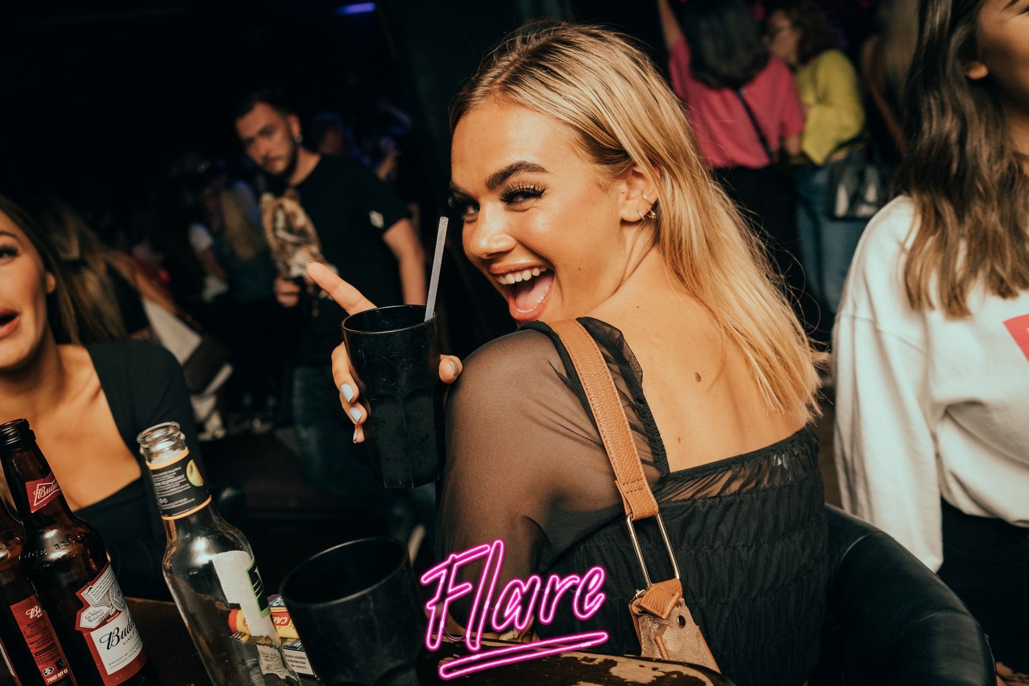 Image may contain: Night Life, Night Club, Alcohol, Beverage, Beer, Drink, Bar Counter, Pub, Club, Person, Human