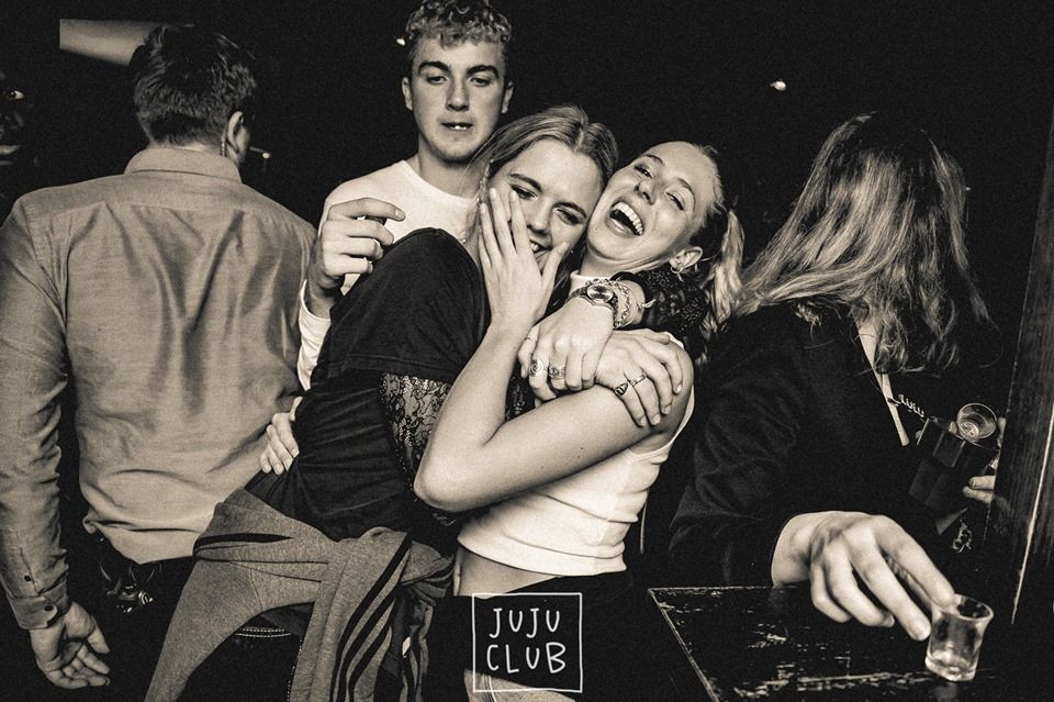 Image may contain: People, Night Club, Club, Face, Human, Person