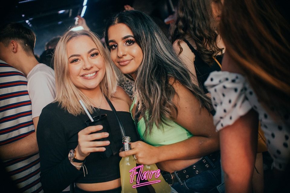 Image may contain: Skin, Night Life, Night Club, Club, Party, Human, Person