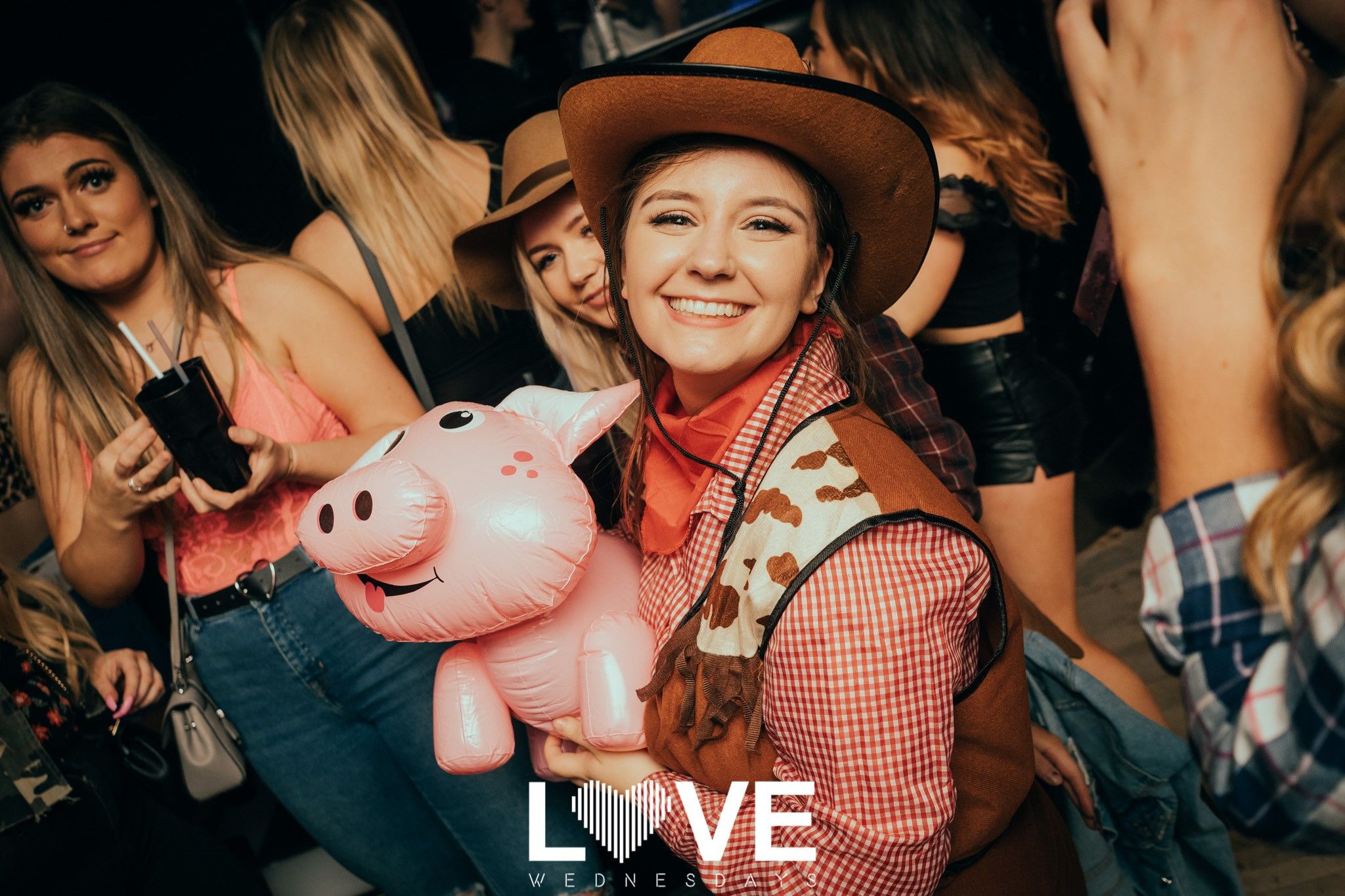 Image may contain: Sun Hat, Night Life, Person, Human, Hat, Apparel, Clothing