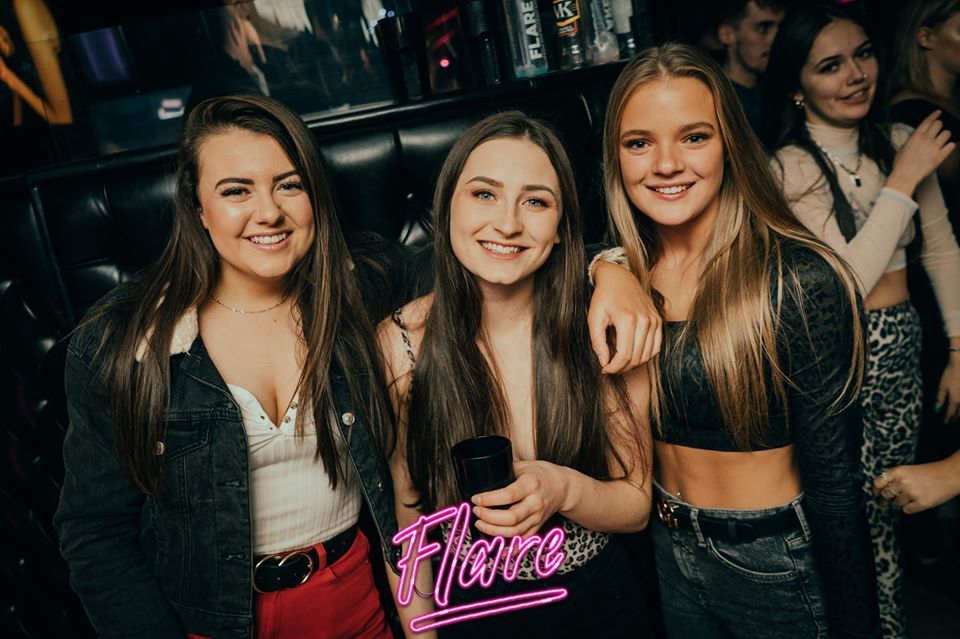 Image may contain: Bar Counter, Pub, Clothing, Apparel, Party, Night Life, Night Club, Club, Human, Person
