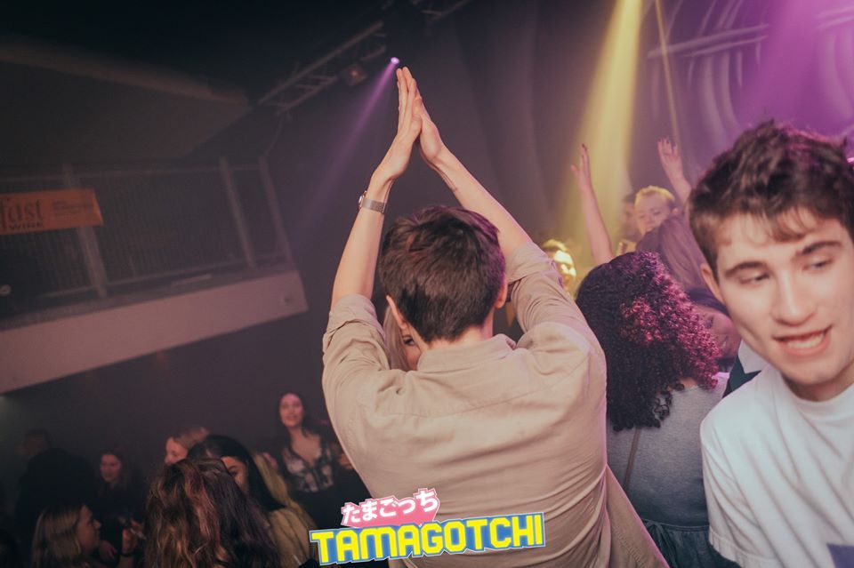 Image may contain: Disco, Crowd, Party, Night Life, Night Club, Club, Person, Human