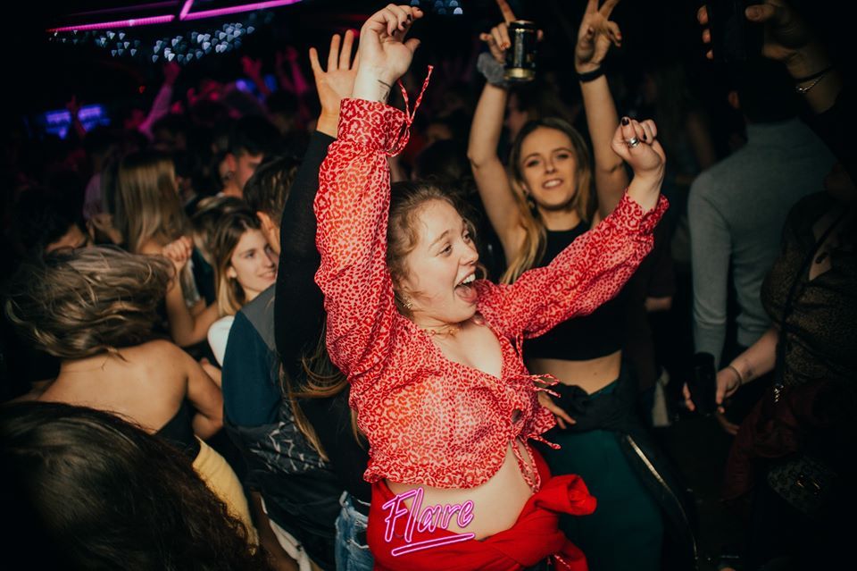 Image may contain: Disco, Leisure Activities, Dance Pose, Party, Night Club, Club, Person, Human, Night Life