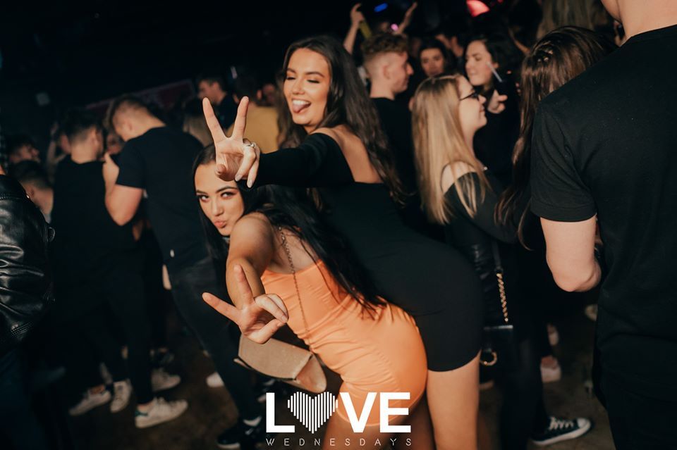 Image may contain: Disco, Leisure Activities, Night Life, Shoe, Apparel, Footwear, Clothing, Club, Night Club, Person, Human, Party
