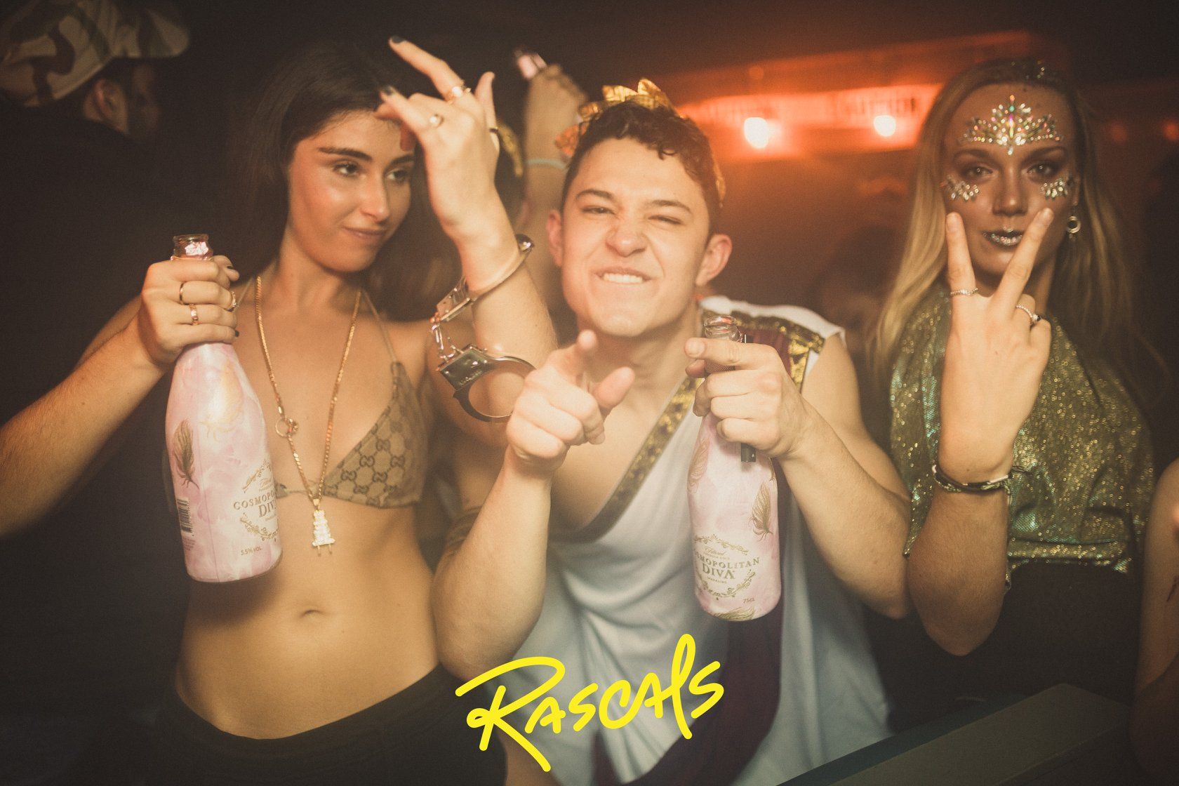 Image may contain: Drink, Beverage, Finger, Night Life, Night Club, Club, Party, Human, Person
