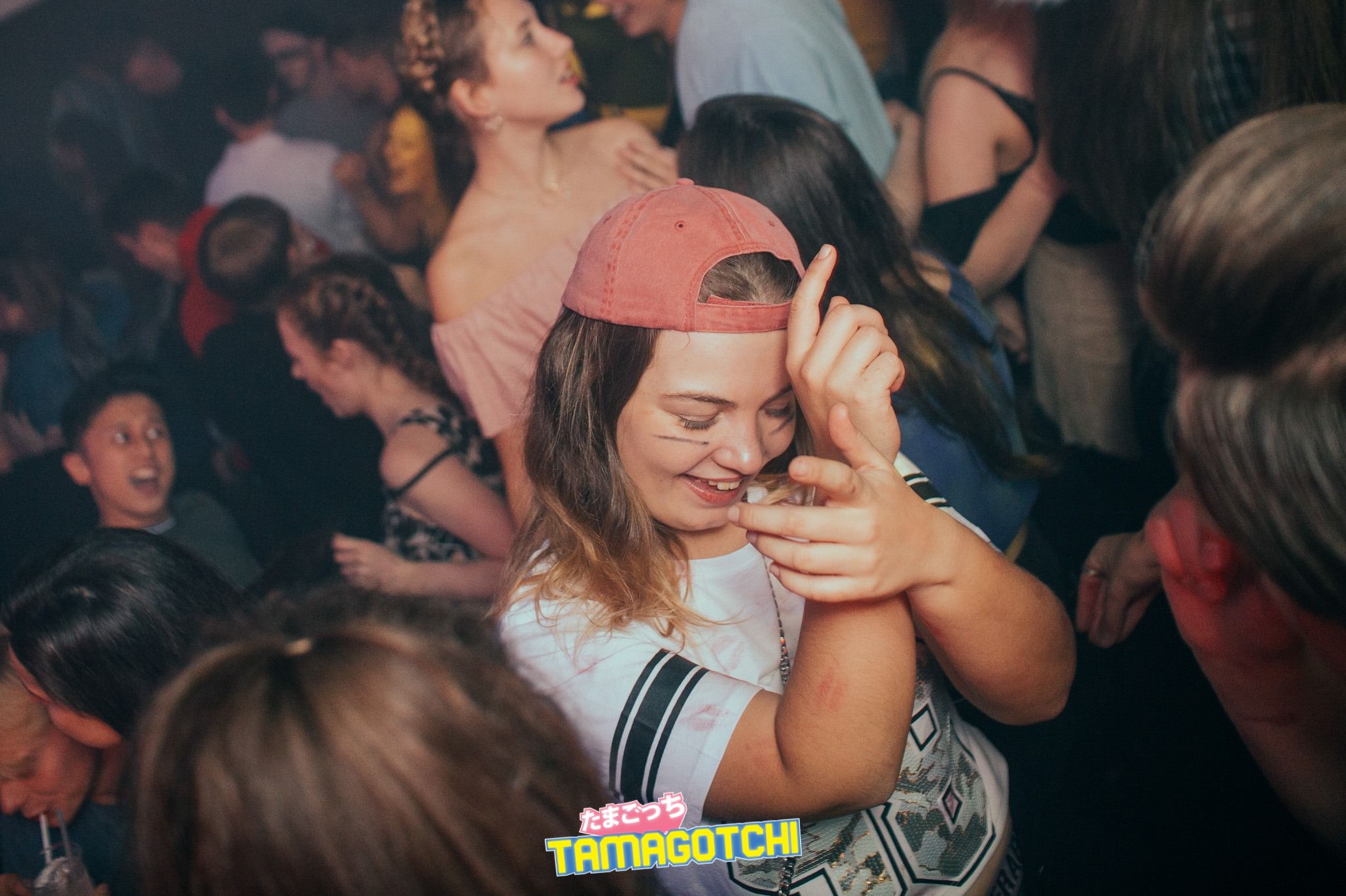 Image may contain: Finger, Night Club, Club, Night Life, Person, Human