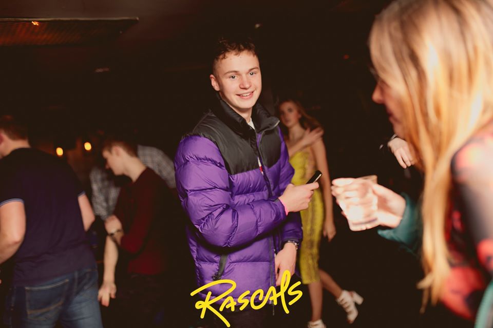 Image may contain: Finger, Party, Night Club, Club, Person, Human