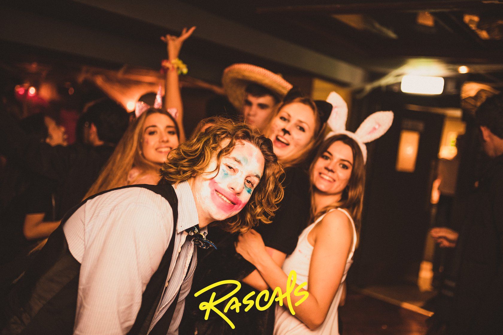 Image may contain: Hat, Apparel, Clothing, Night Life, Party, Night Club, Club, Person, Human