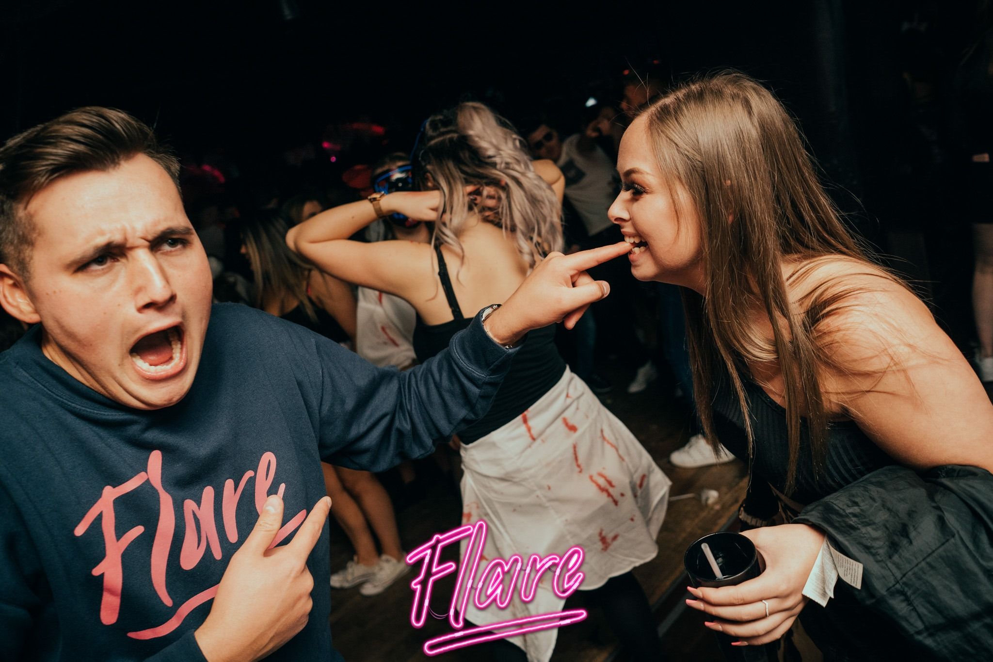 Image may contain: Leisure Activities, Night Club, Club, Party, Night Life, Person, Human