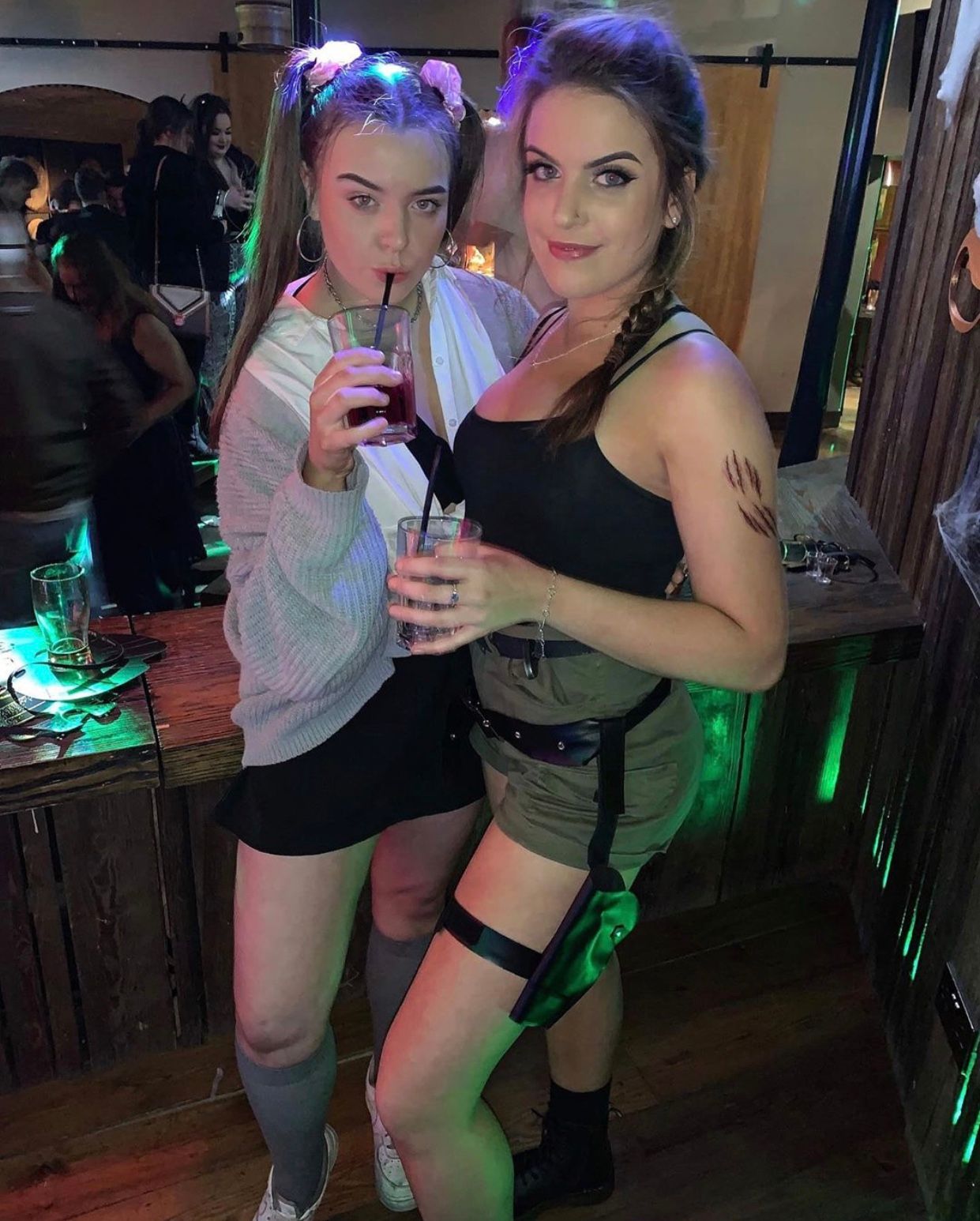 Image may contain: Night Club, Bar Counter, Pub, Club, Skin, Clothing, Apparel, Human, Person, Night Life