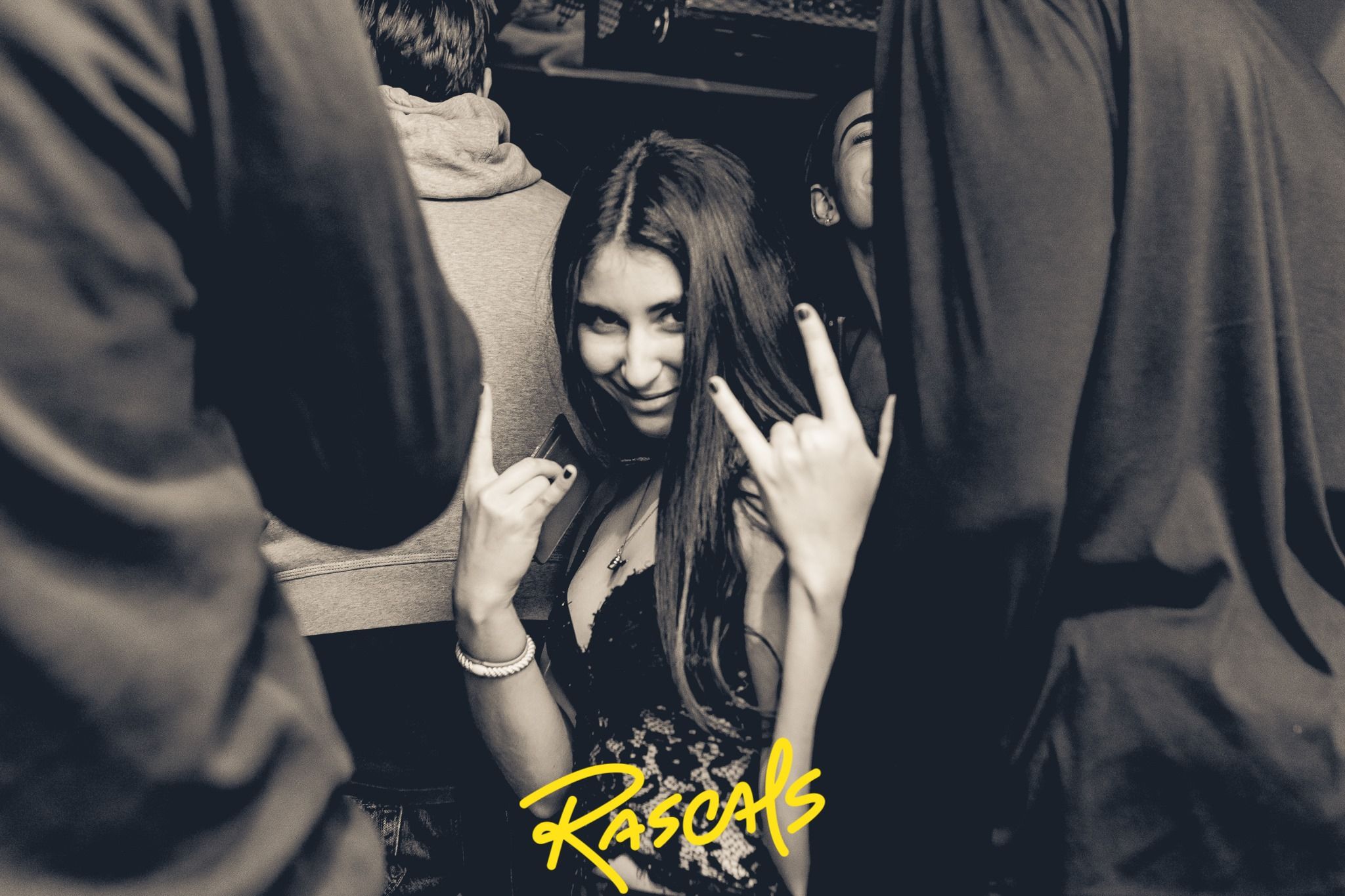 Image may contain: Night Club, Club, Finger, Human, Person