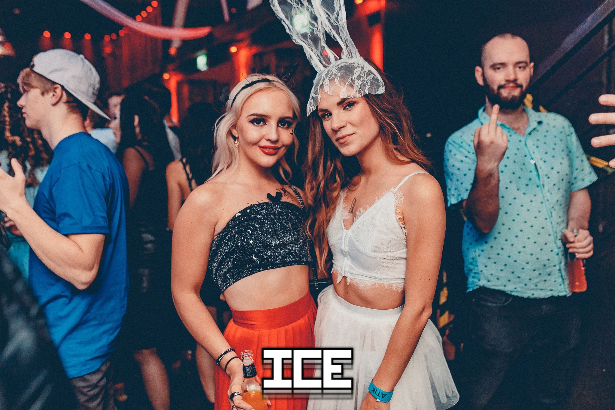 Image may contain: Night Club, Club, Hat, Apparel, Clothing, Person, Human