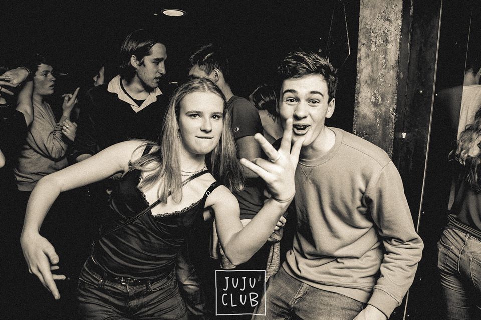Image may contain: Night Club, Face, Clothing, Apparel, Party, Club, Human, Person