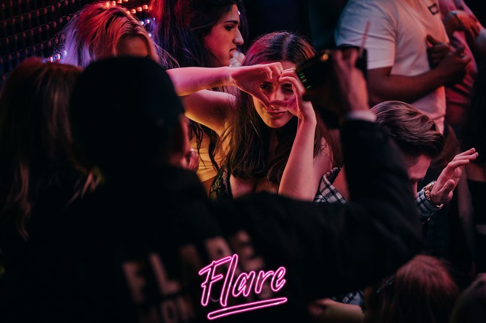 Image may contain: Night Life, Night Club, Party, Club, Human, Person