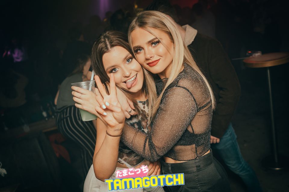 Image may contain: Night Life, Party, Skin, Night Club, Club, Human, Person