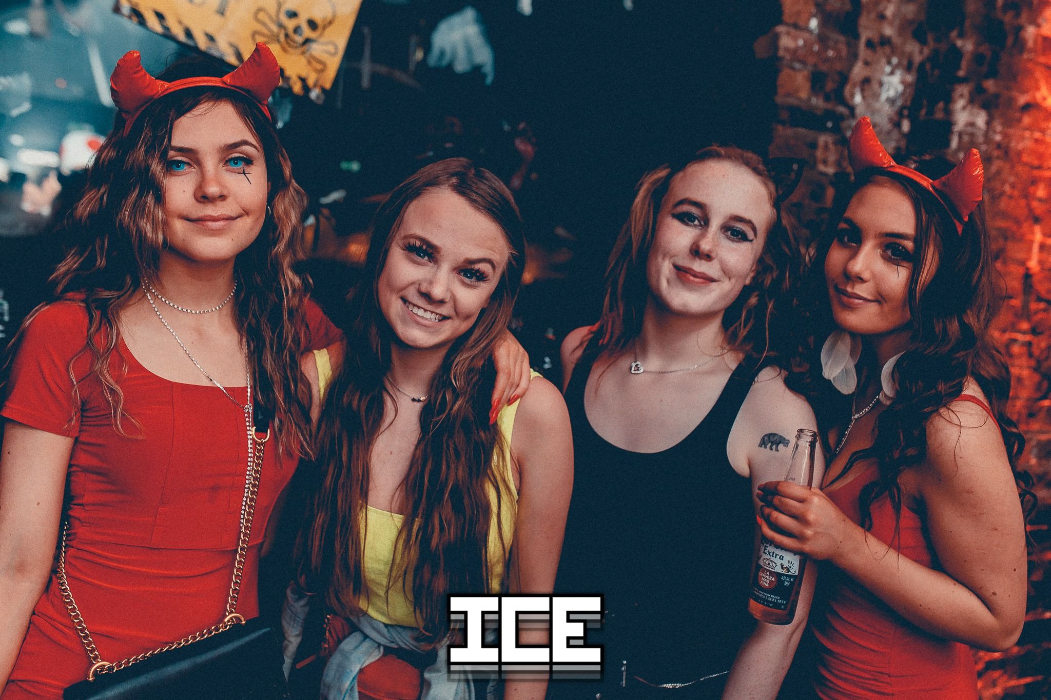 Image may contain: Party, Night Club, Skin, Club, Person, Human
