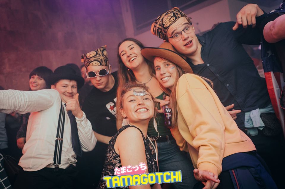 Image may contain: People, Hat, Apparel, Clothing, Club, Face, Photo Booth, Party, Person, Human, Accessory, Sunglasses, Accessories