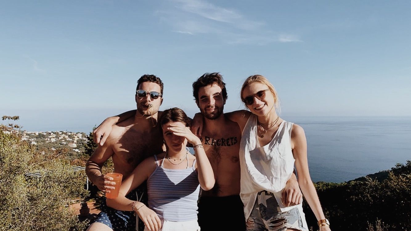 Image may contain: Portrait, Photo, Photography, Female, Family, Tourist, Face, People, Clothing, Apparel, Shorts, Vacation, Accessories, Accessory, Sunglasses, Person, Human