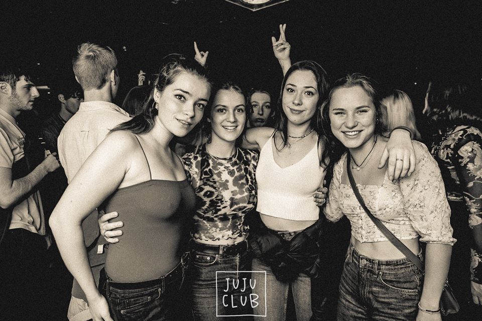 Image may contain: Pub, Skin, Party, Night Club, Club, Human, Person