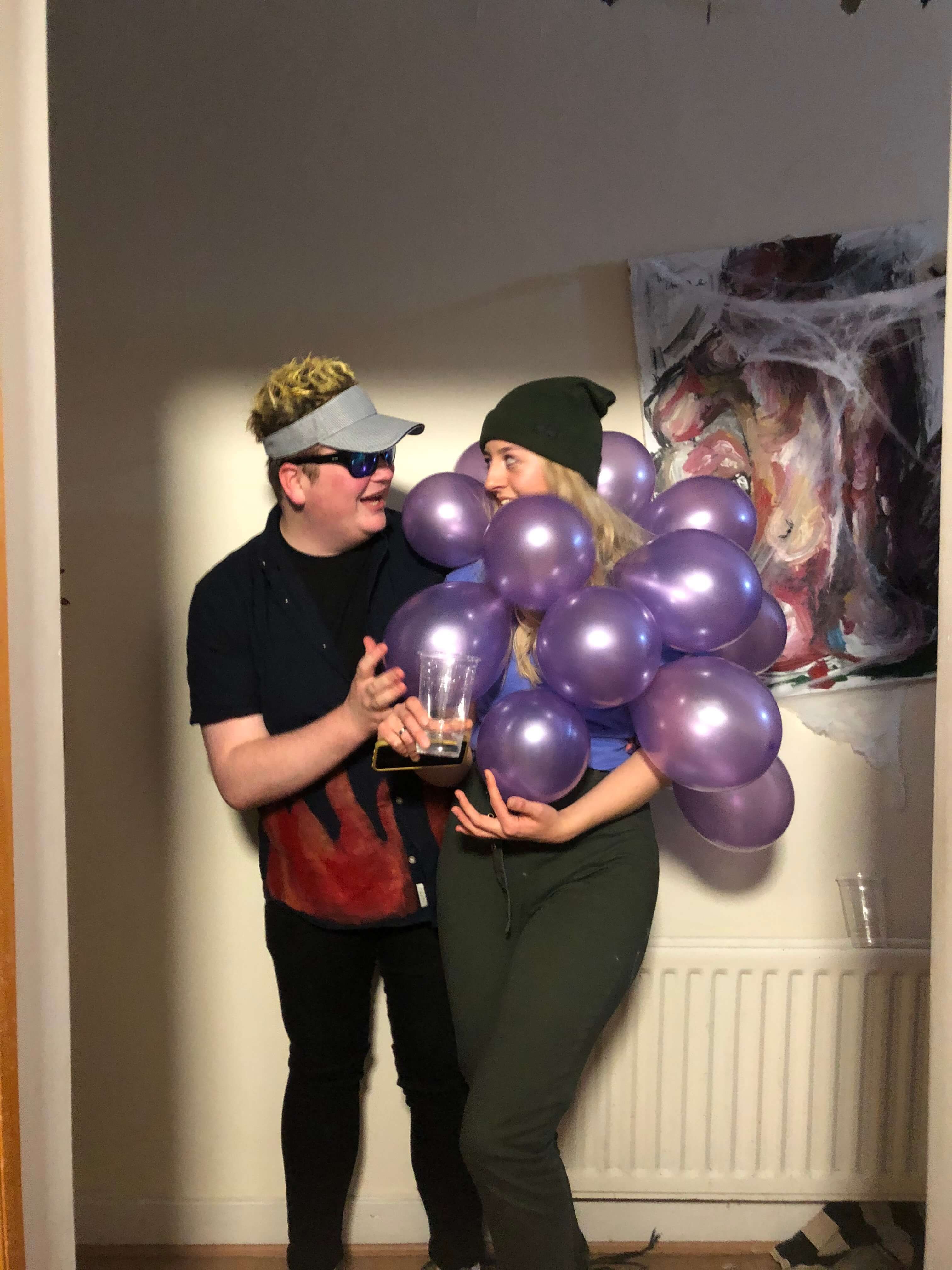 Image may contain: Sphere, Apparel, Clothing, Hat, Accessories, Accessory, Sunglasses, Balloon, Ball, Person, Human