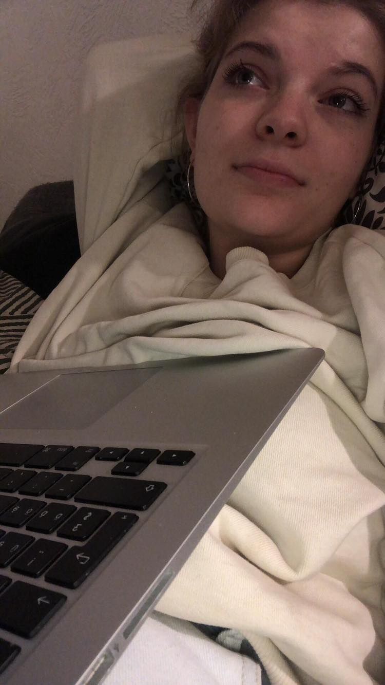 Image may contain: Cushion, Pillow, Human, Person, Laptop, Furniture, Keyboard, Computer Keyboard, Computer Hardware, Hardware, Computer, Pc, Electronics