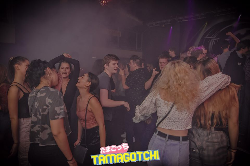Image may contain: Disco, Party, Night Club, Club, Person, Human