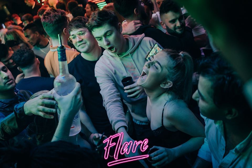 Image may contain: Interior Design, Indoors, Audience, Crowd, Night Club, Club, Party, Human, Person