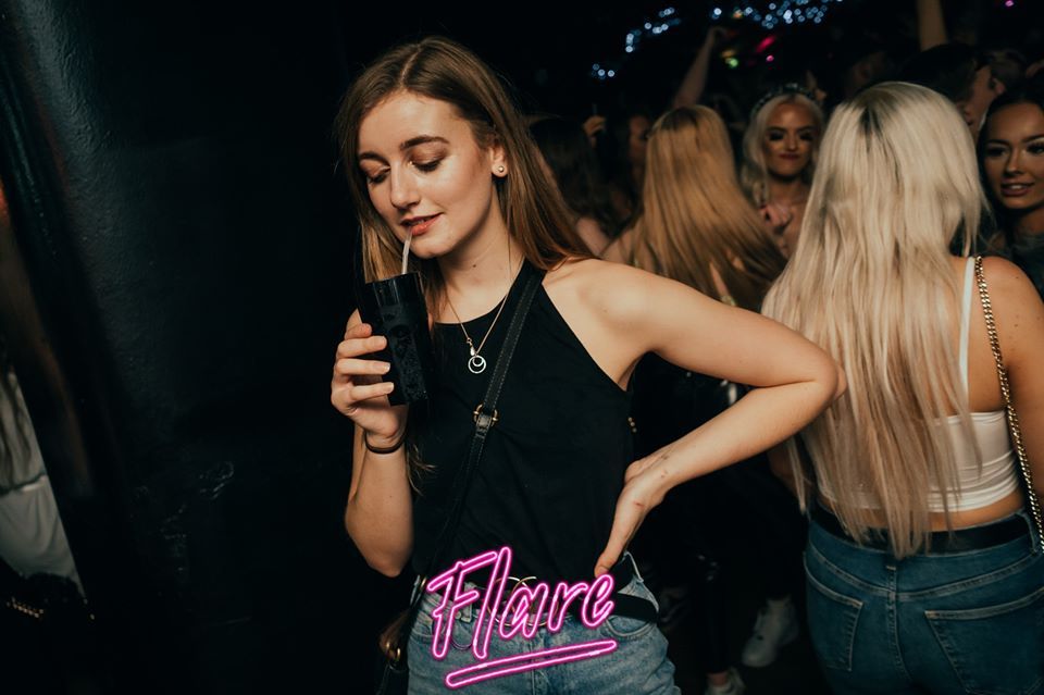 Image may contain: Party, Clothing, Apparel, Night Club, Night Life, Club, Person, Human
