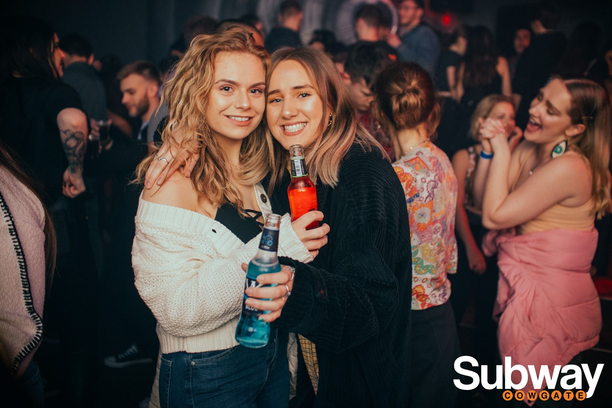 Image may contain: Drink, Beverage, Night Club, Night Life, Club, Party, Human, Person