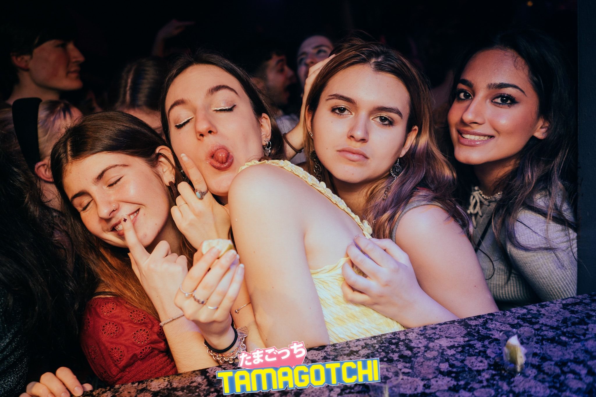 Image may contain: Finger, Party, Night Club, Club, Night Life, Human, Person