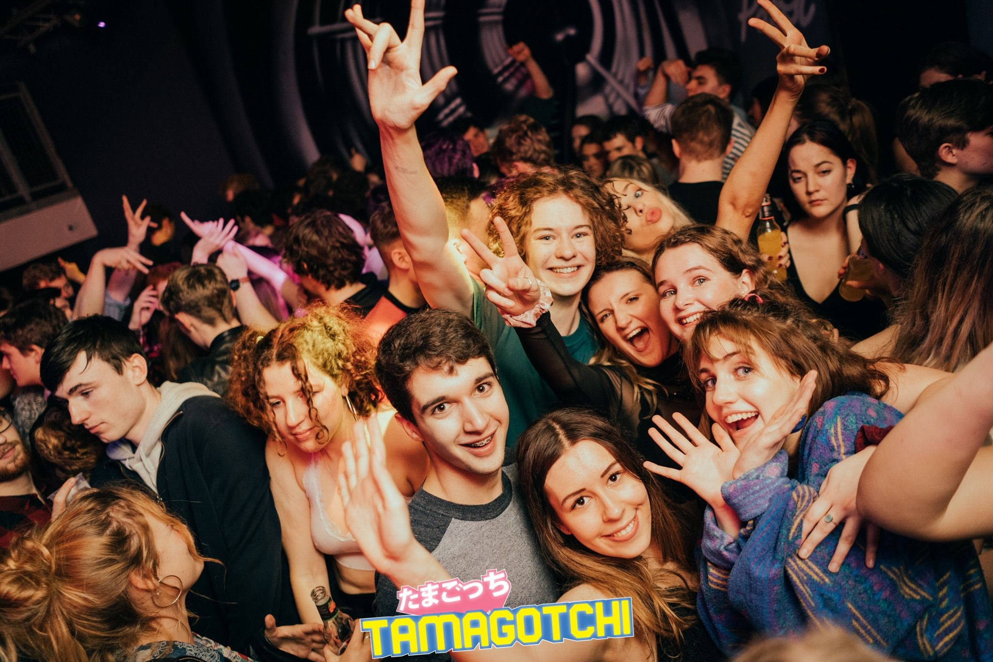 Image may contain: Head, Club, Crowd, Audience, Face, Night Life, Party, Person, Human
