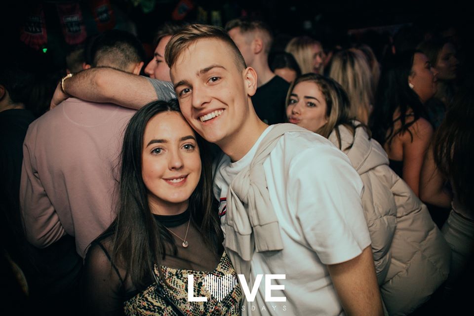 Image may contain: Night Club, Audience, Crowd, Club, Night Life, Party, Human, Person