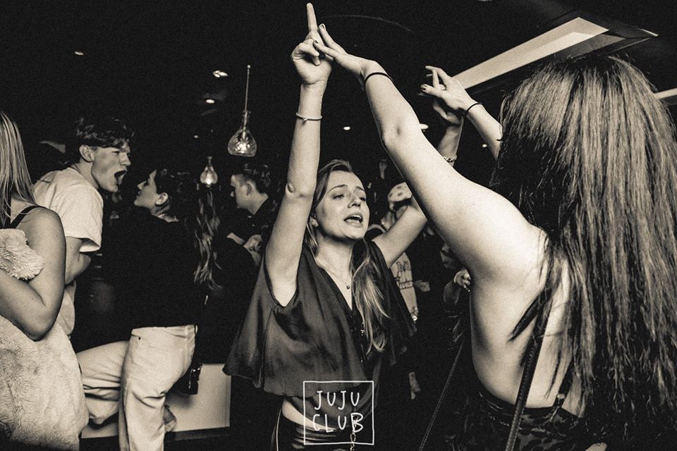 Image may contain: Night Life, Party, Skin, Night Club, Club, Person, Human