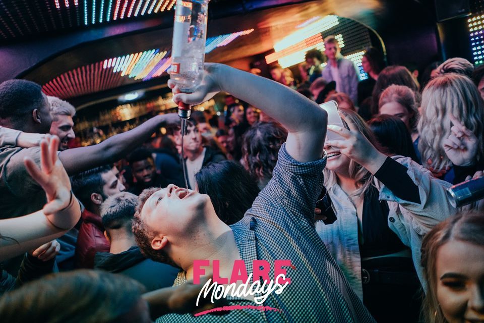 Image may contain: Pub, Crowd, Night Club, Party, Club, Night Life, Person, Human