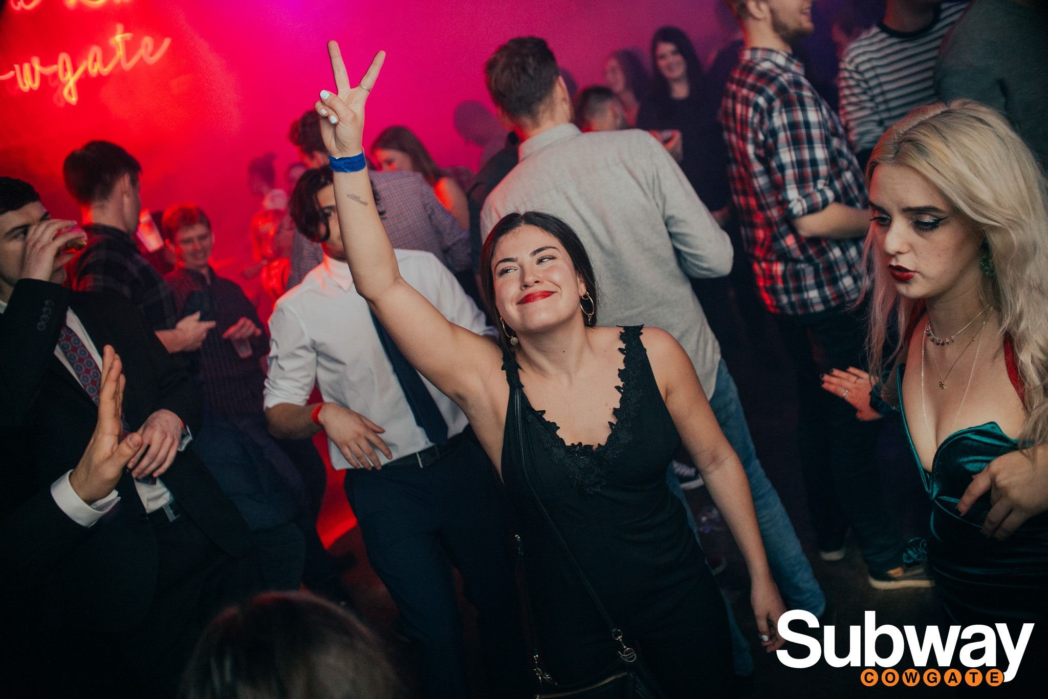 Image may contain: Pub, Night Life, Disco, Party, Night Club, Club, Human, Person