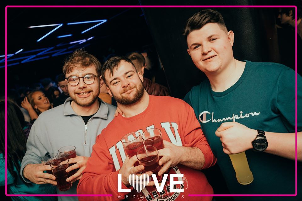 Image may contain: Alcohol, Wristwatch, Night Life, Party, Club, Beverage, Drink, Face, Glasses, Accessories, Accessory, Clothing, Apparel, Human, Person
