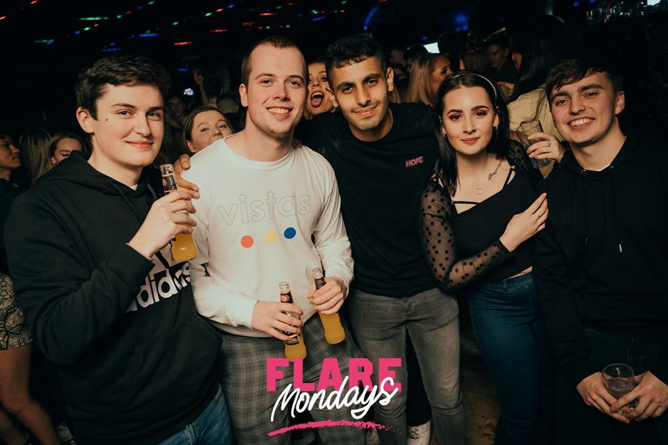 Image may contain: Bar Counter, Pub, Shoe, Clothing, Footwear, Apparel, Night Life, Night Club, Club, Party, Human, Person
