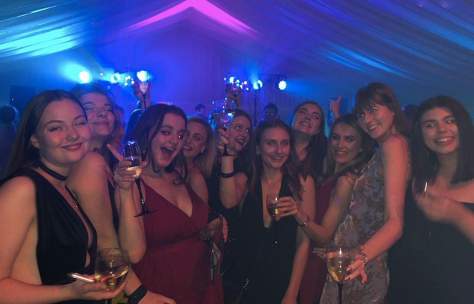Image may contain: Beverage, Drink, Night Life, Night Club, Club, Human, Person, Party