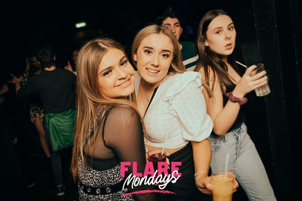 Image may contain: Dating, Night Life, Party, Night Club, Club, Person, Human