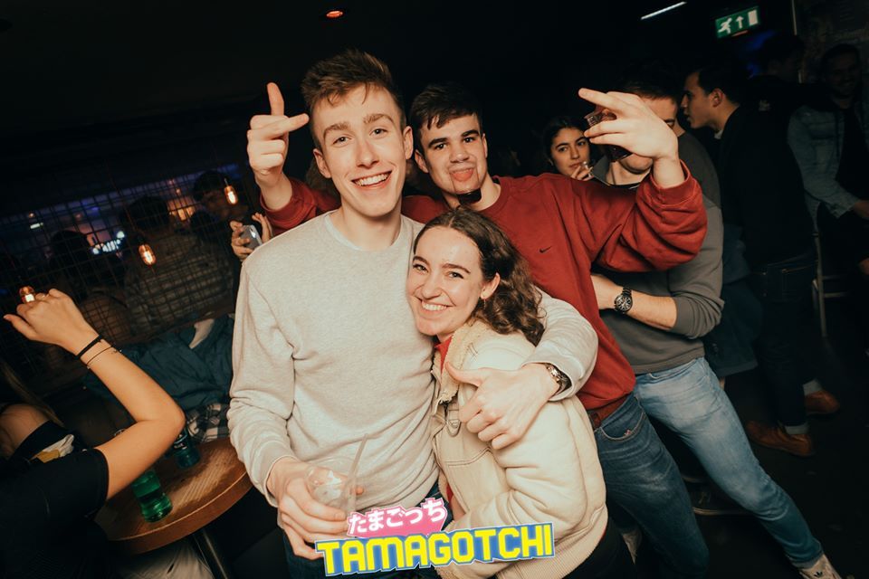 Image may contain: Family, Night Life, Night Club, Footwear, Clothing, Apparel, Shoe, Party, Club, People, Human, Person