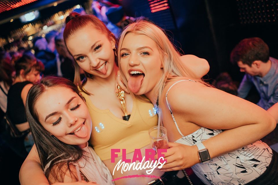 Image may contain: Night Club, Club, Party, Human, Person