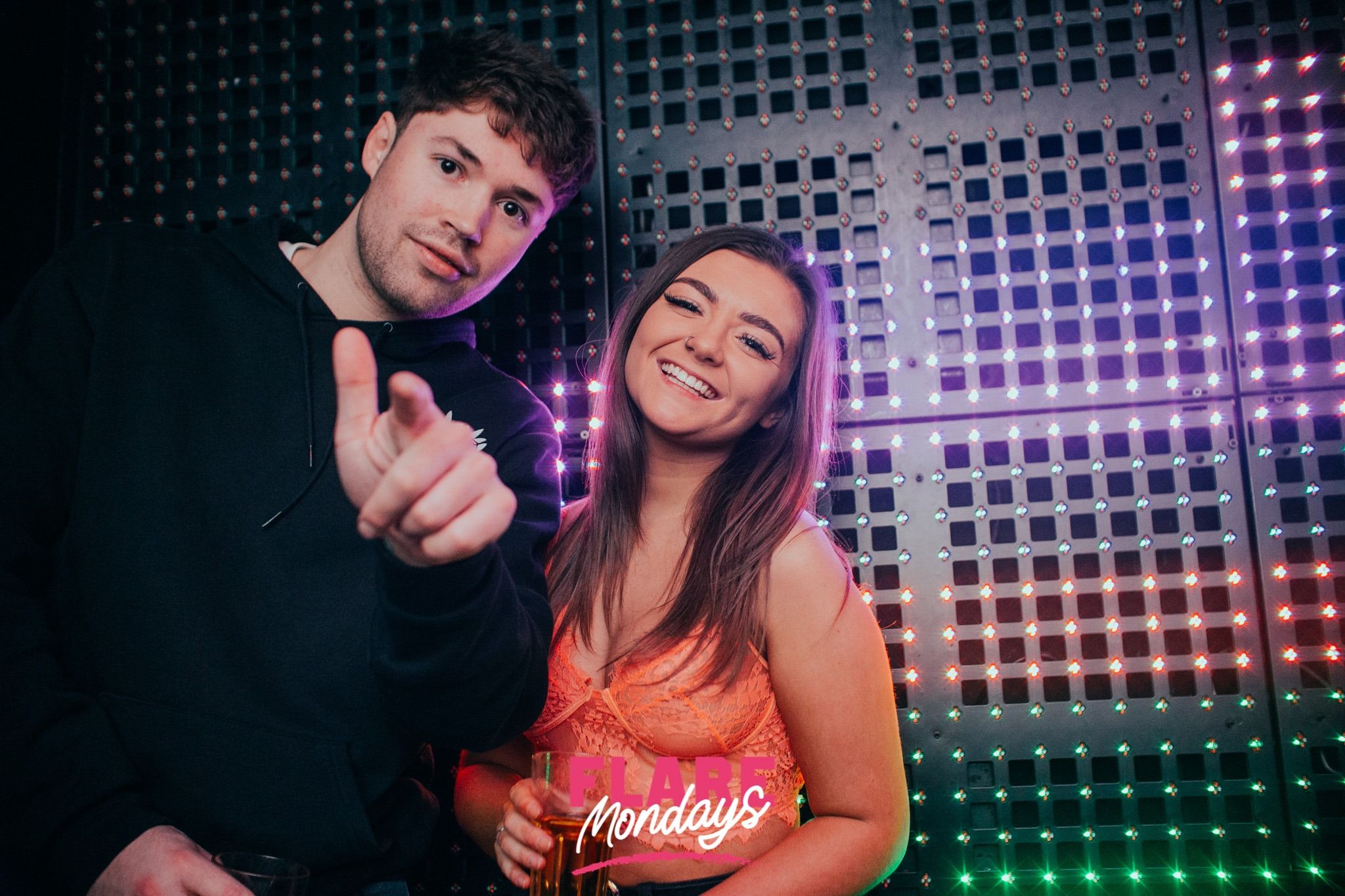 Image may contain: Night Life, Finger, Night Club, Club, Person, Human