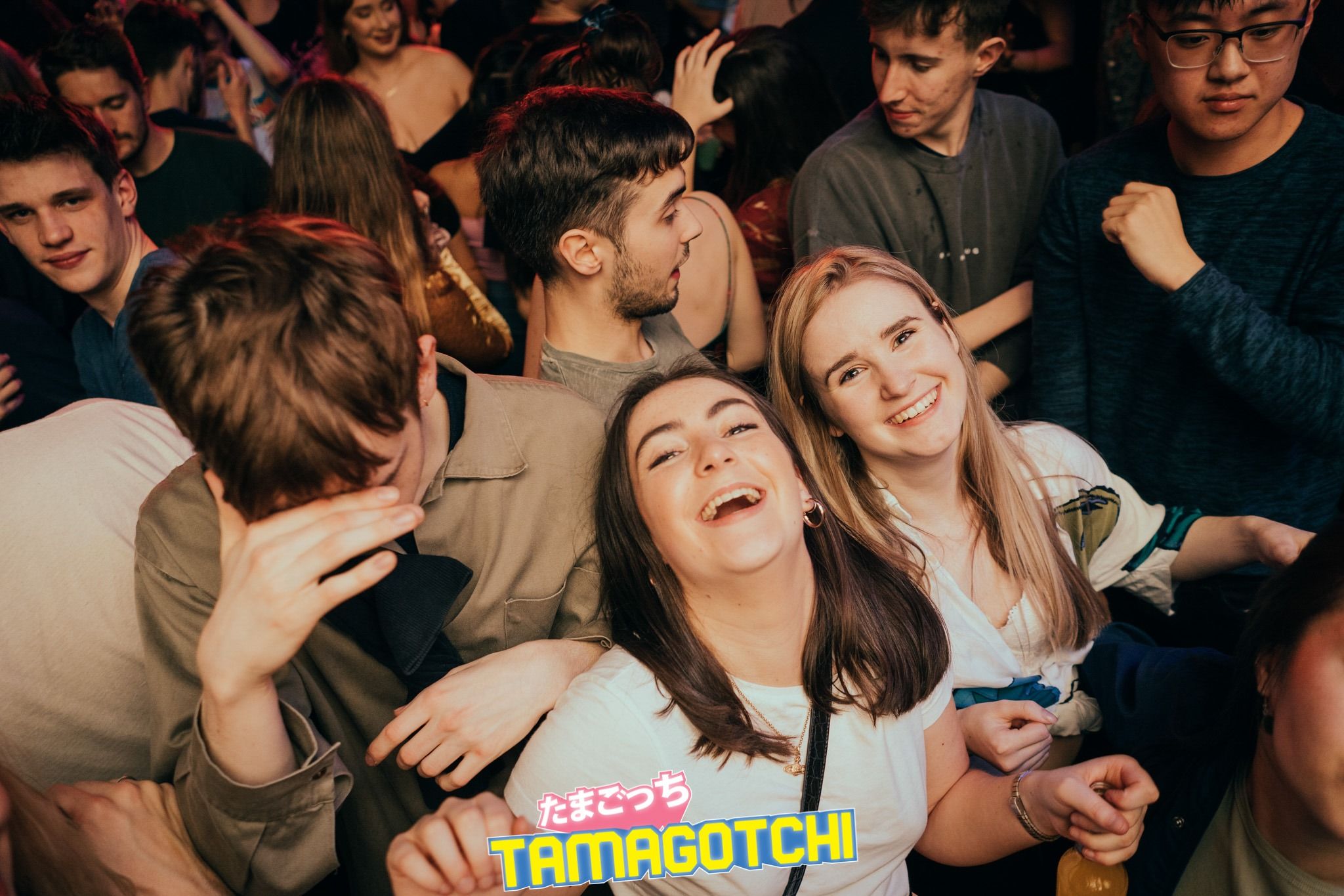 Image may contain: People, Face, Night Club, Club, Audience, Crowd, Party, Human, Person