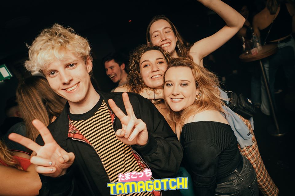 Image may contain: People, Night Club, Club, Face, Party, Human, Person