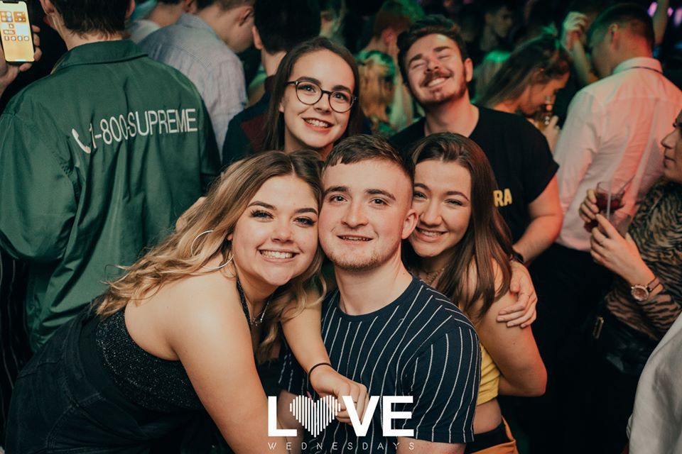Image may contain: People, Night Club, Face, Club, Night Life, Accessories, Glasses, Accessory, Party, Person, Human